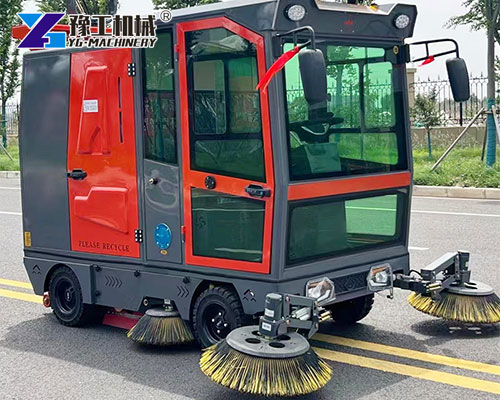 Battery-powered industrial sweeper in action