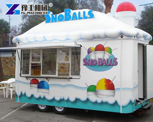 Commercial snow cone trailer in operation