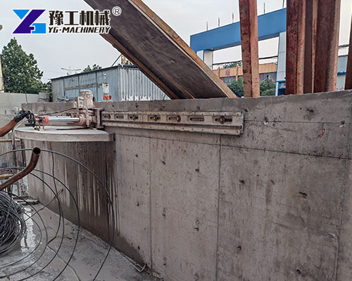 Construction work operating wall saw