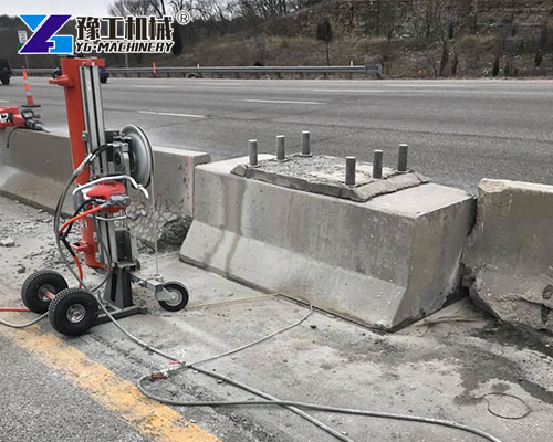 Diamond wire saw cutting concrete beam