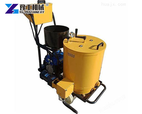 Hand-pushed road repair machine