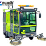 Industrial floor sweeper cleaning warehouse