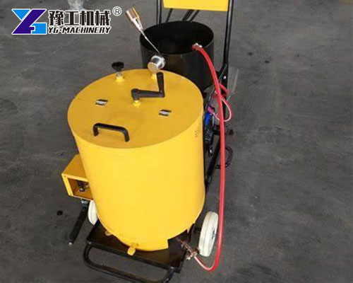 Parking lot crack sealing machine