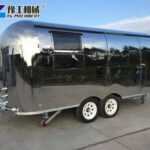 Polished aluminum food trailer