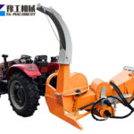 PTO wood chipper attached to tractor