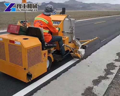 Small Self-Driving Road Striper At Work