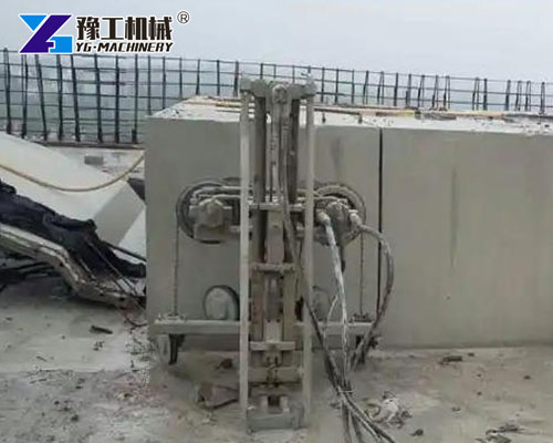 Wire saw cutting reinforced concrete