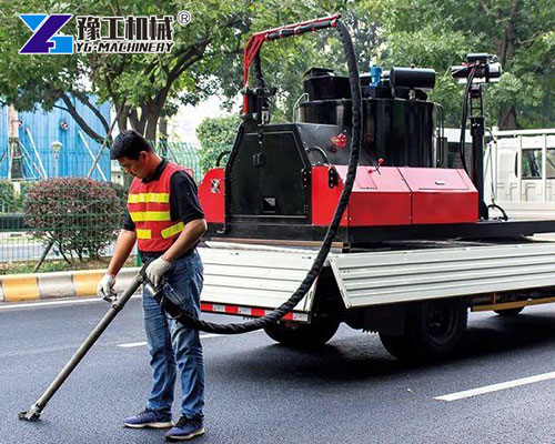YG truck-mounted asphalt repair machine working