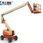Articulating man lift working in warehouse
