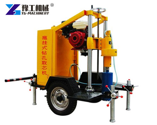 Asphalt core drilling machine with water tank