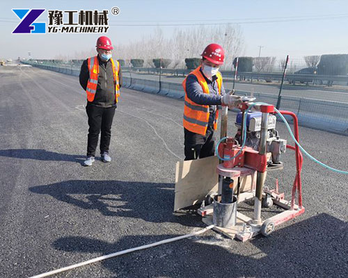Asphalt coring rig testing pavement quality