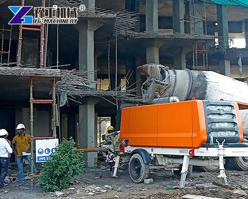 Diesel Concrete Pump Working on Building Project