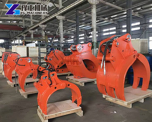 Heavy machinery rock grab lifting timber