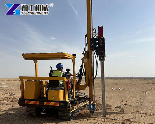 Hydraulic PV pile driver on construction site