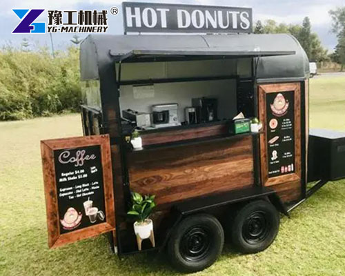 Portable donut trailer serving fresh hot donuts