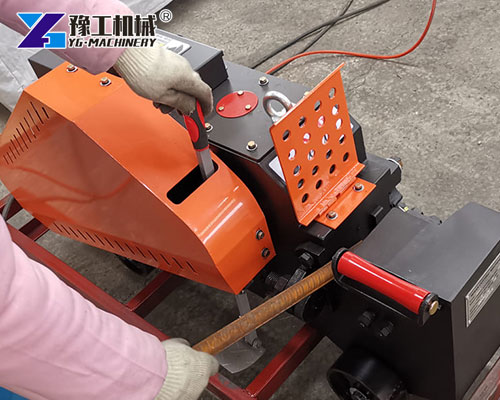 Steel processing machine cutting rebars