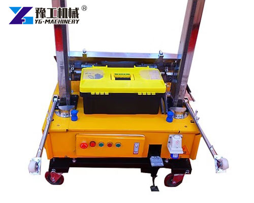 Automatic plaster machine on jobsite wall