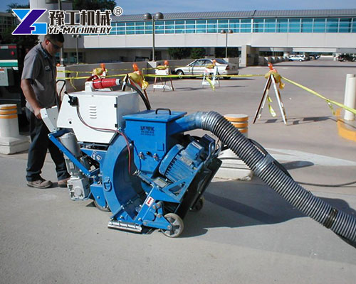 Concrete blaster removing paint and old surface layer