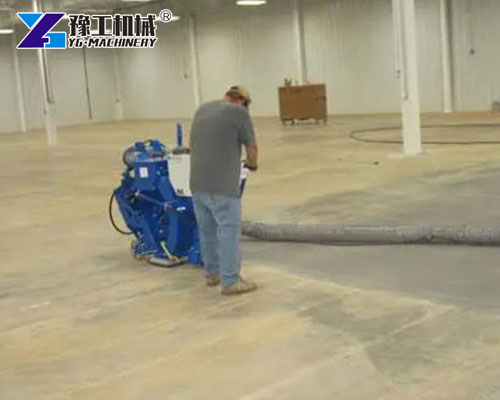 Concrete shot blaster cleaning industrial workshop floor