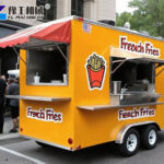 Food trailer serving fries at street market