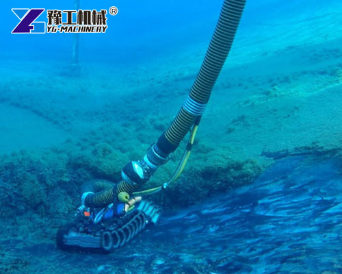 Robotic dredging machine removing silt deposits