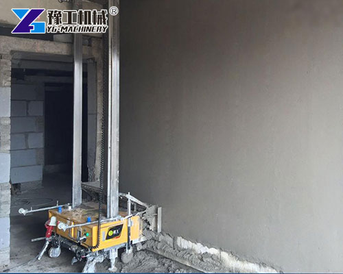 Wall rendering machine producing smooth finish