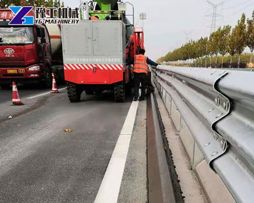 Concrete curb forming machine with vibration system