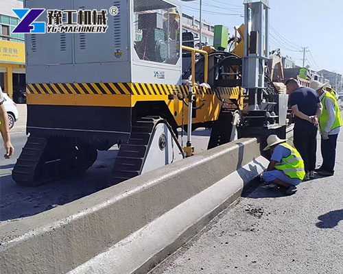 Curb and gutter machine paving city road