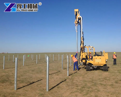 Solar farm pile driver on rough terrain