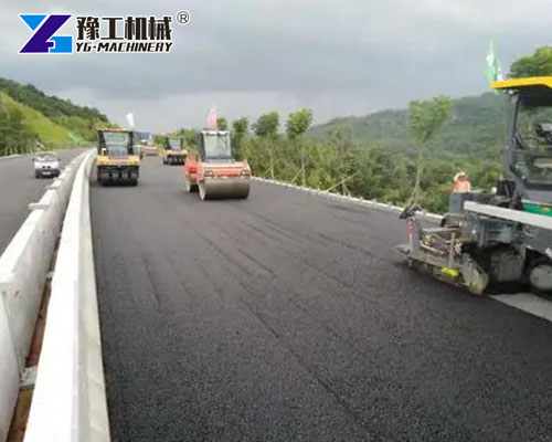 curb gutter slipform machine working site