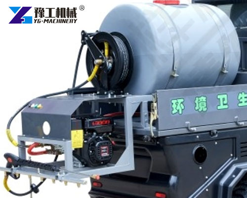 High pressure washer for snow sweeper machine