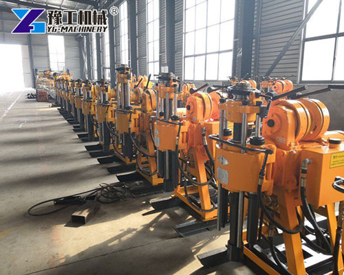 Mining workers using portable core drilling rig